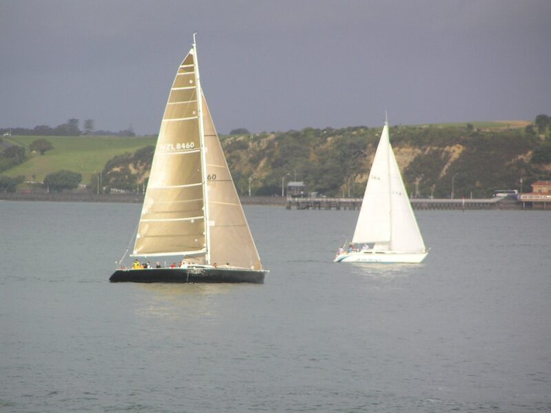 Sail boats racing on Manukau Harbour Auckland New Zealand
