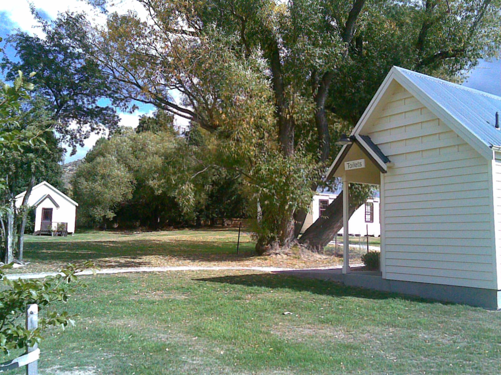 Cardrona Valley historic church school and public buildings among trees New Zealand