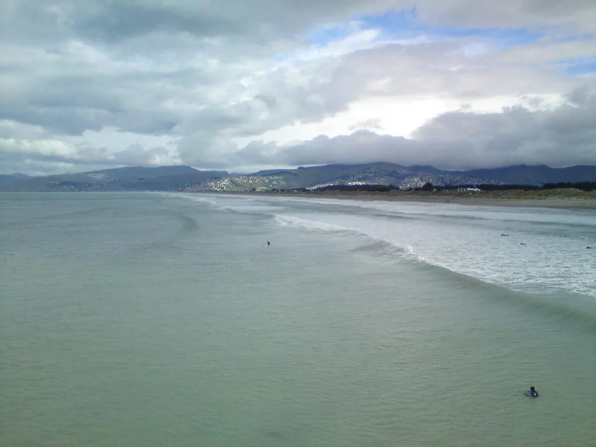 View from New Brighton Pier looking along the Christchurch coastline towards the Port Hills