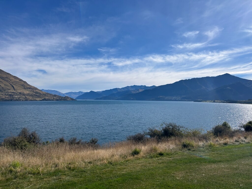The 8th hole at Jacks Point Golf Course with Lake Wakatipu and the Remarkables mountains Queenstown New Zealand