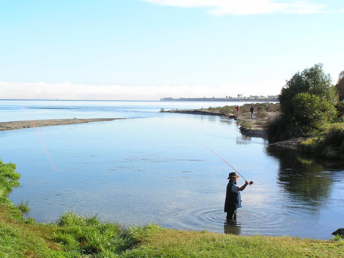 Trout fishing on a river near Lake Taupō New Zealand