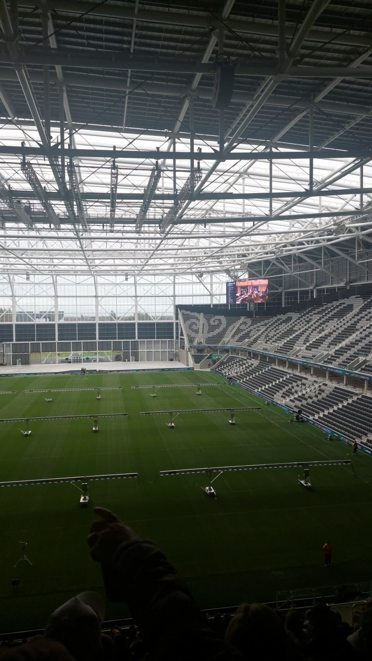 View of ETFE roof and screen from upper tier at One NZ Stadium Te Kaha