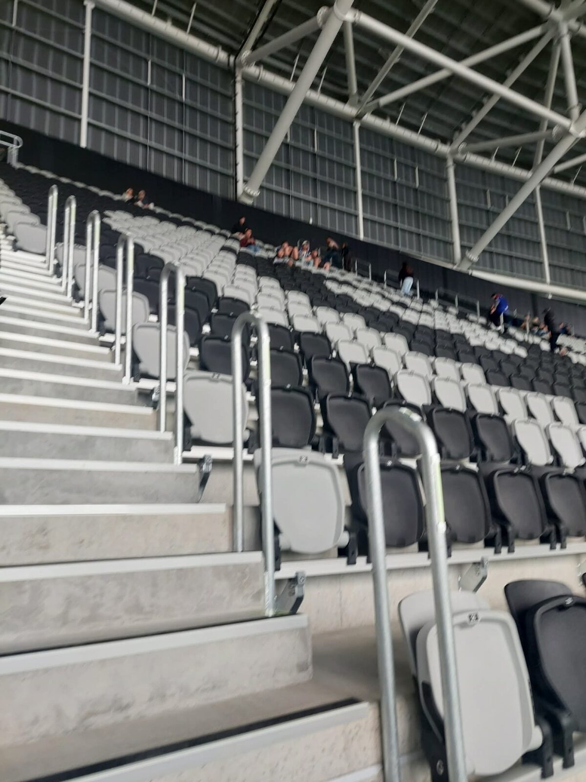 Kowhaiwhai patterned seating at One NZ Stadium Te Kaha Christchurch