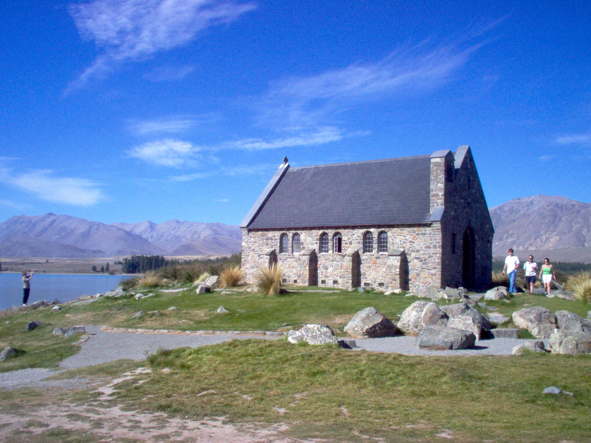 Church of the Good Shepherd Lake Tekapo with mountains behind New Zealand