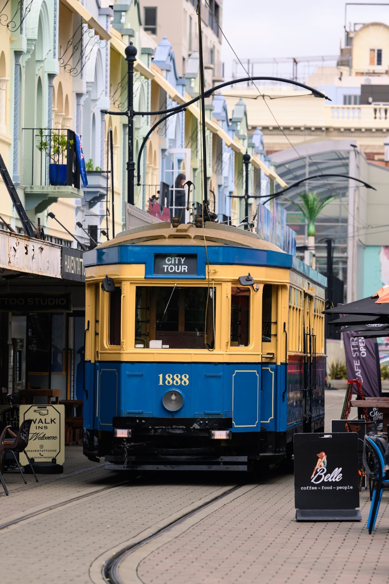 Christchurch heritage tram on New Regent Street with colourful buildings