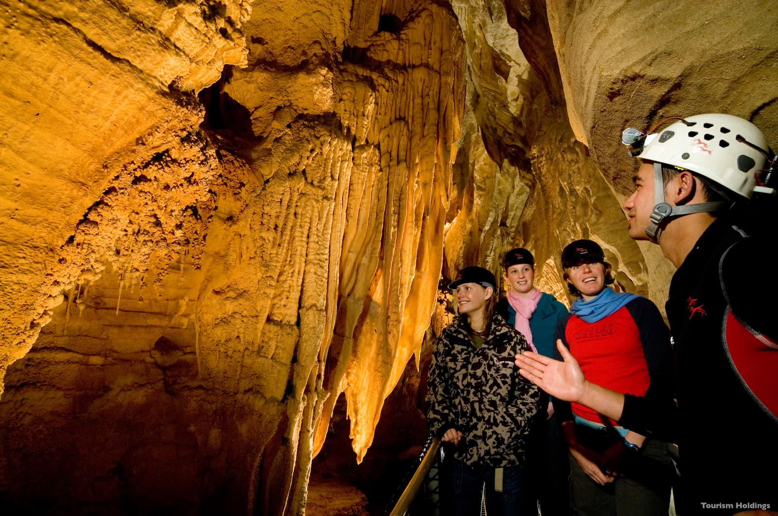 Guided tour through Waitomo Caves limestone stalactites and formations
