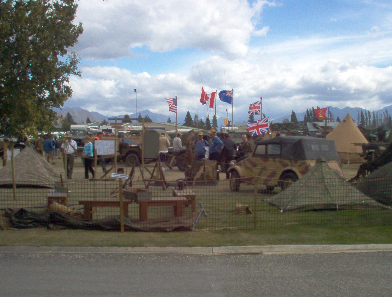 Military history army display with vehicles and flags at Warbirds Over Wanaka New Zealand
