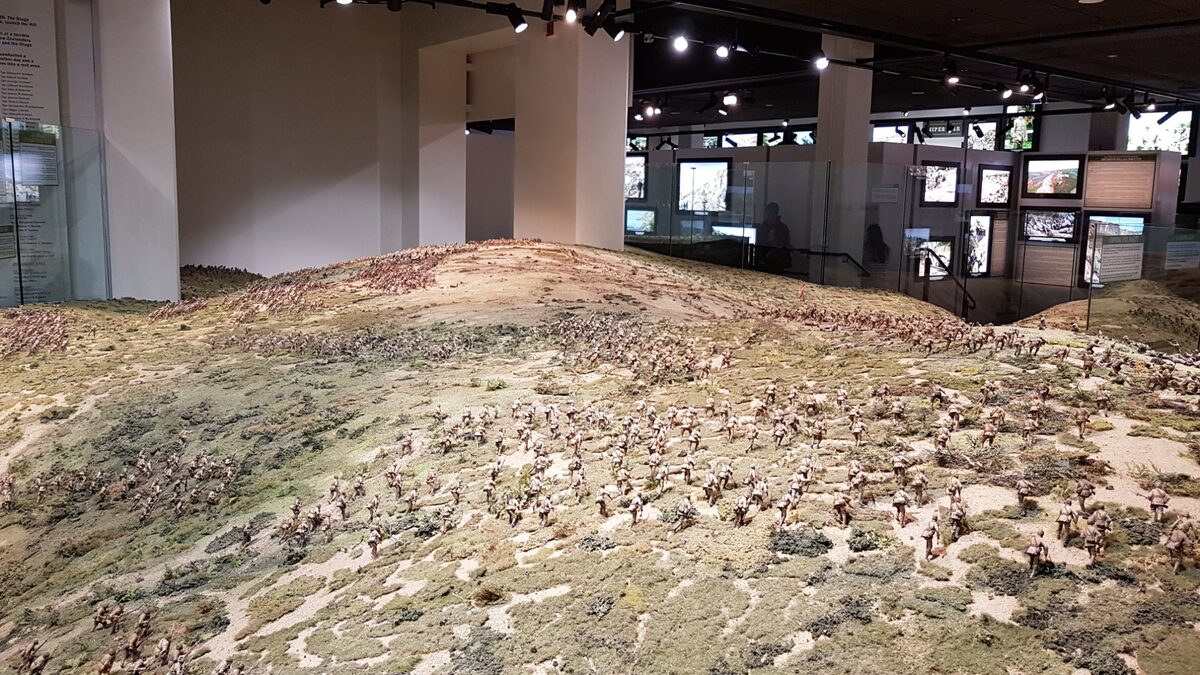 Detailed WWI battlefield diorama with hundreds of miniature soldiers at the Great War Exhibition Wellington